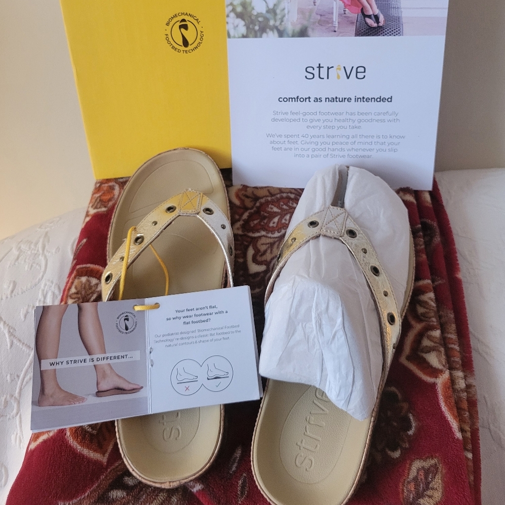 Strive Gold and Tan Sandals